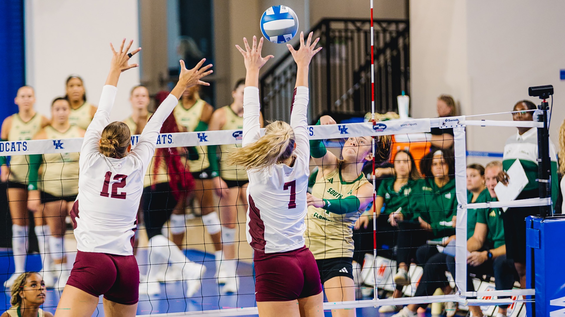 Caitlyn Flees and Emilee Hill block an attack against South Florida