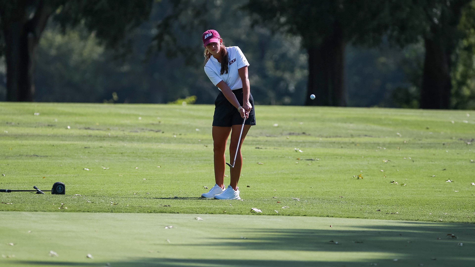 Claira Ramsey Eden chips onto the green in practice at the University Club