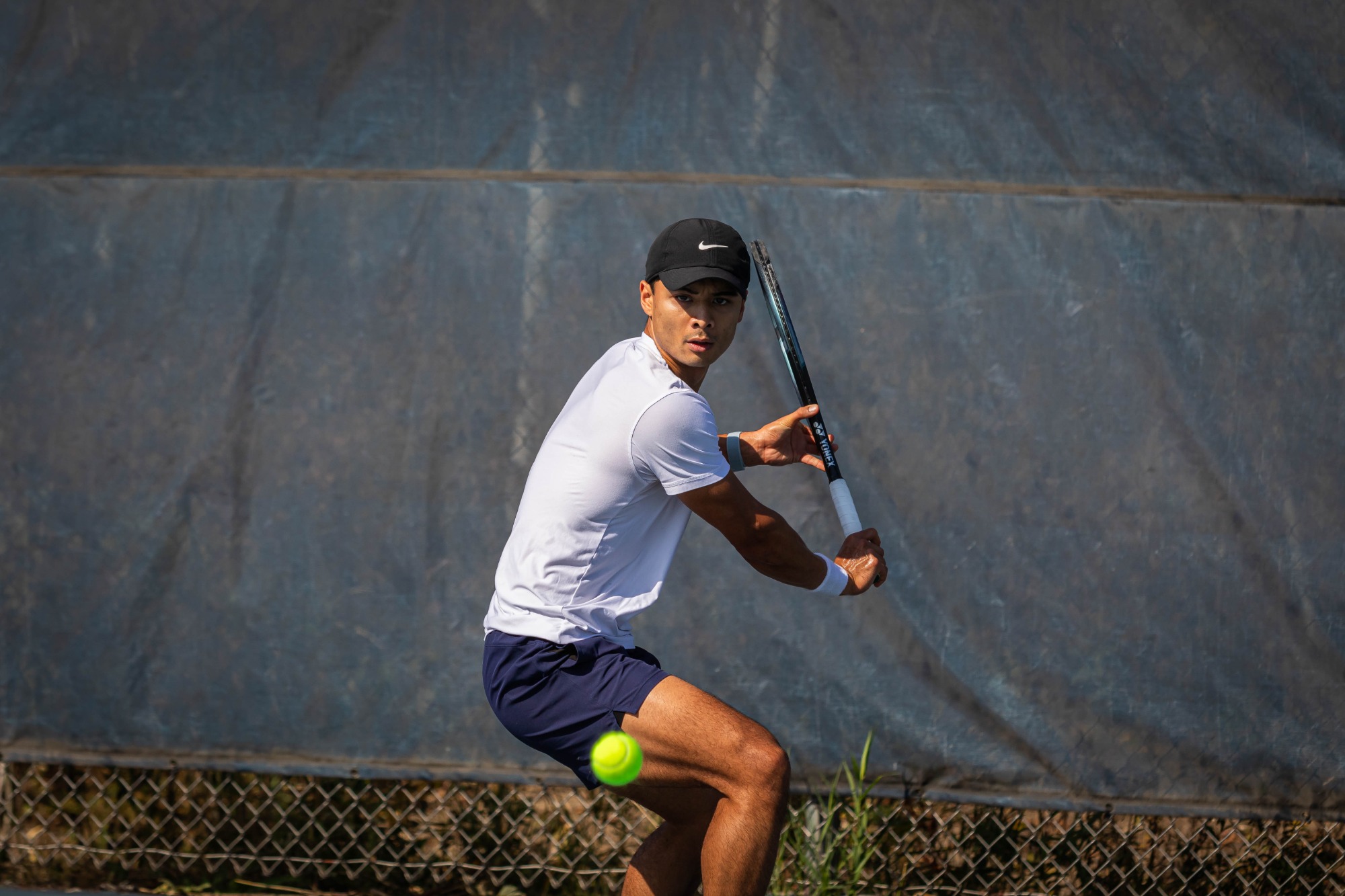 Russell Reyes during the Elmhurst University men's tennis match vs. Roosevelt University at Lester Brune Tennis Courts in Elmhurst, IL on 10/9/2024. Photo by Matthew Haufe, Elmhurst Athletics.