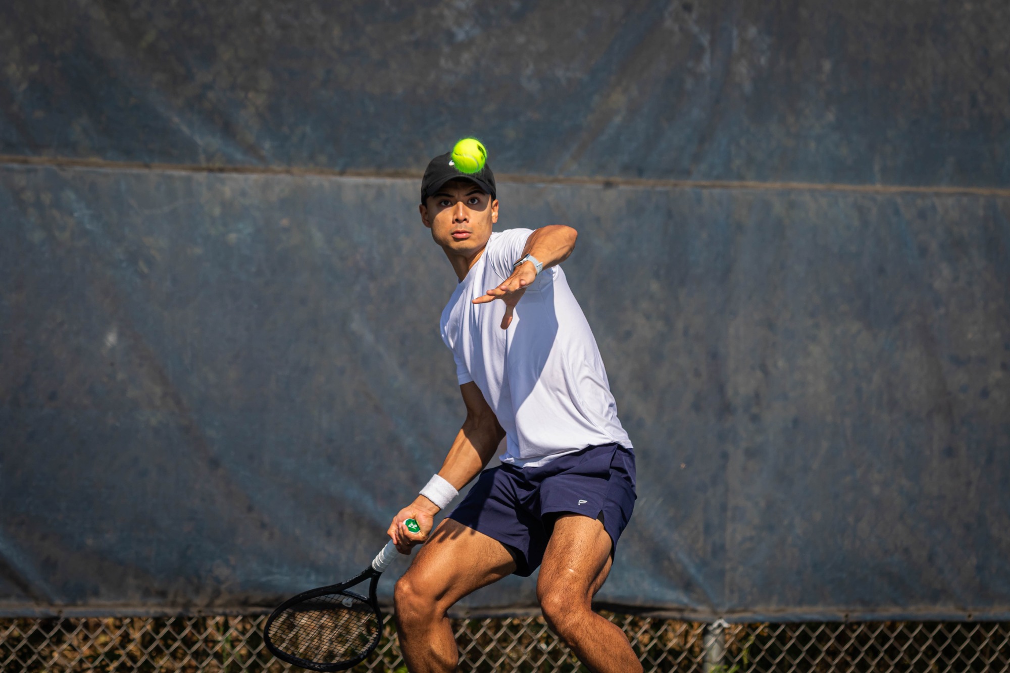 Russell Reyes during the Elmhurst University men's tennis match vs. Roosevelt University at Lester Brune Tennis Courts in Elmhurst, IL on 10/9/2024. Photo by Matthew Haufe, Elmhurst Athletics.