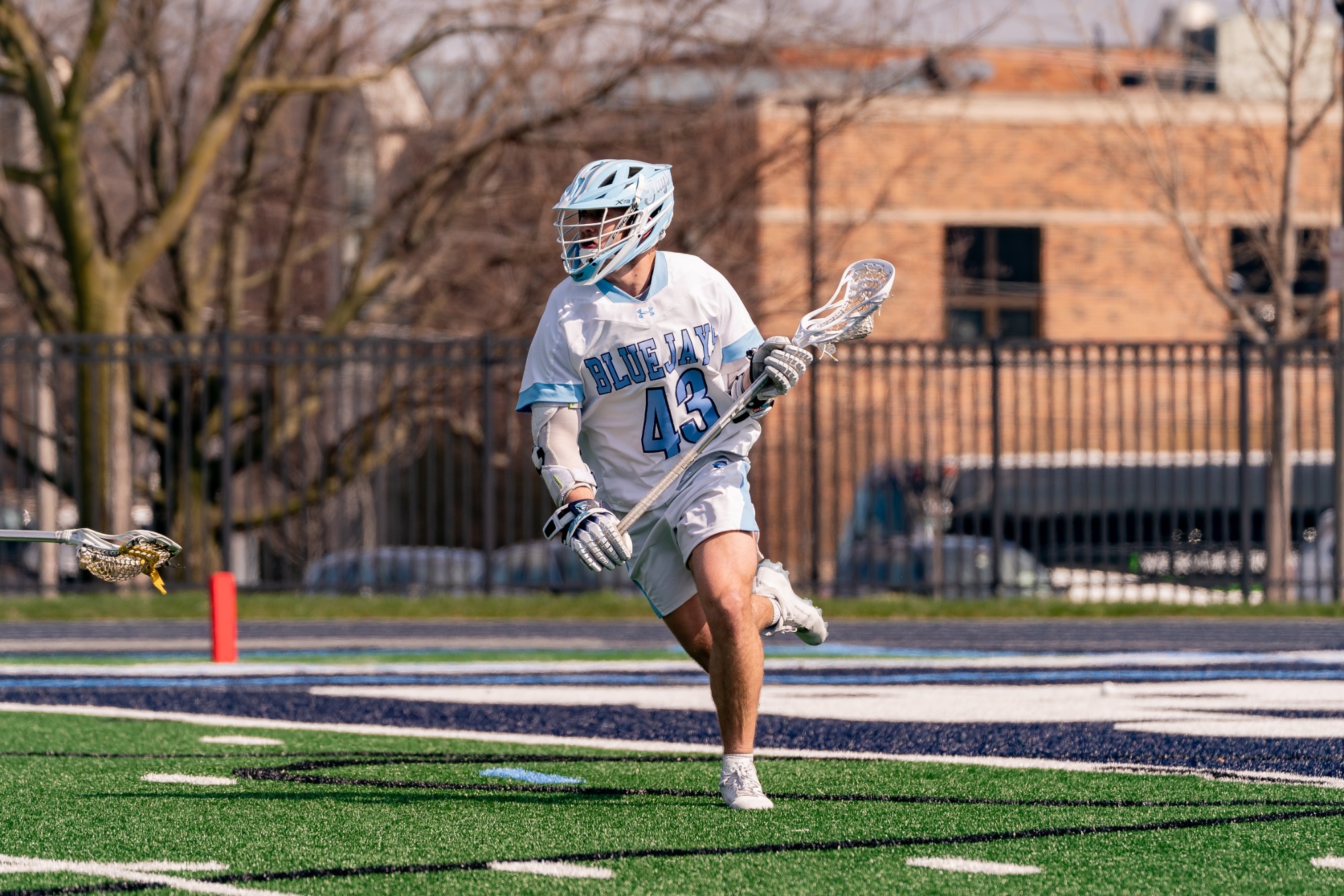 ELMHURST, IL - March 30th, 2024 - Elmhurst Attacker Hunter Hernandez (#43) during the game between the Southwestern Pirates and the Elmhurst Bluejays at Langhorst Field in Elmhurst, IL. Photo By Harry Figiel