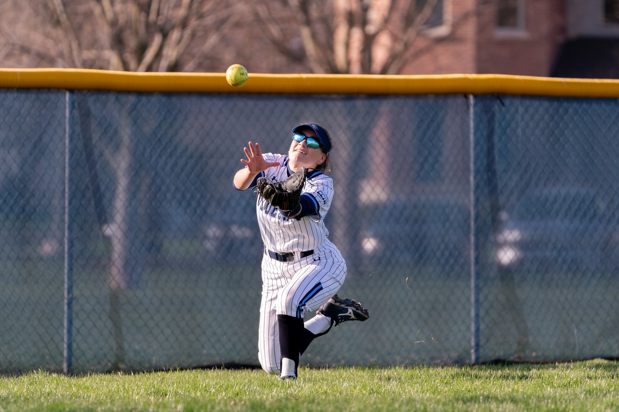 ELMHURST, IL - April 9th, 2024 - Elmhurst Utility Bailey Hodel (#20) during the game between the Wheaton Thunder and the Elmhurst Bluejays at Salt Creek Park in Elmhurst, IL. Photo By Harry Figiel