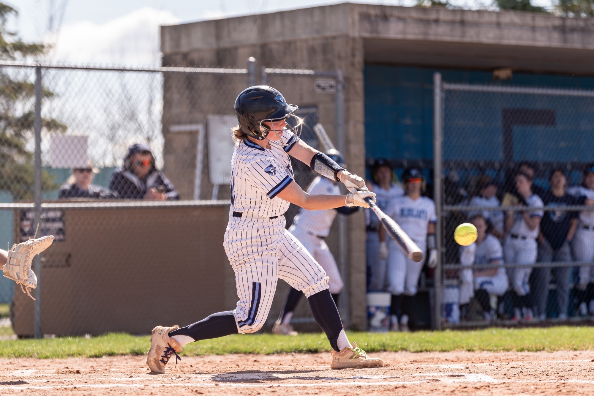 ELMHURST, IL - April 9th, 2024 - Elmhurst Pitcher/Infielder Gianna Amundsen (#00) during the game between the Wheaton Thunder and the Elmhurst Bluejays at Salt Creek Park in Elmhurst, IL. Photo By Harry Figiel