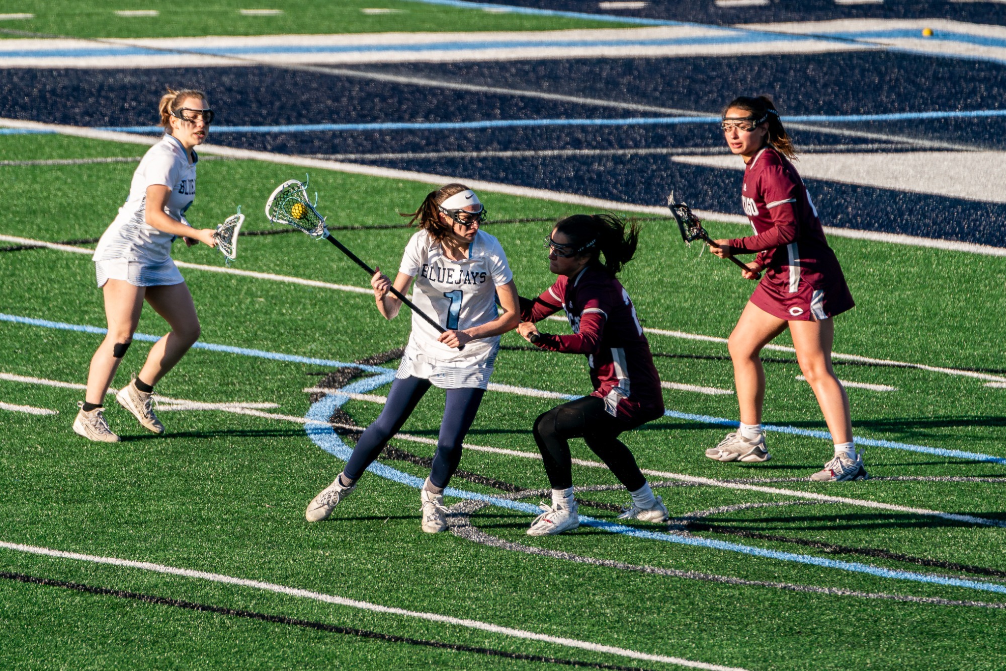 ELMHURST, IL - April 24th, 2024 - Elmhurst Midfielder Gracie Eastman (#1) during the game between the University of Chicago Maroons and the Elmhurst Bluejays at Langhorst Field in Elmhurst, IL. Photo By Harry Figiel