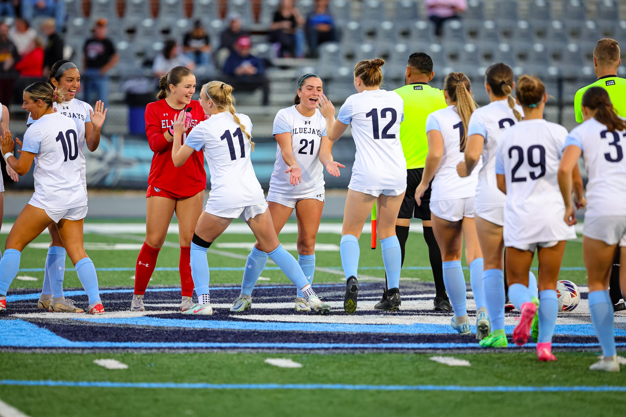 Elmhurst student-athletes and coaches during the Elmhurst Women's Soccer game vs. Ripon College on 9/9/2025 at Langhorst Field in Elmhurst, IL. Photo by Norman Cohen/Elmhurst Athletics.
