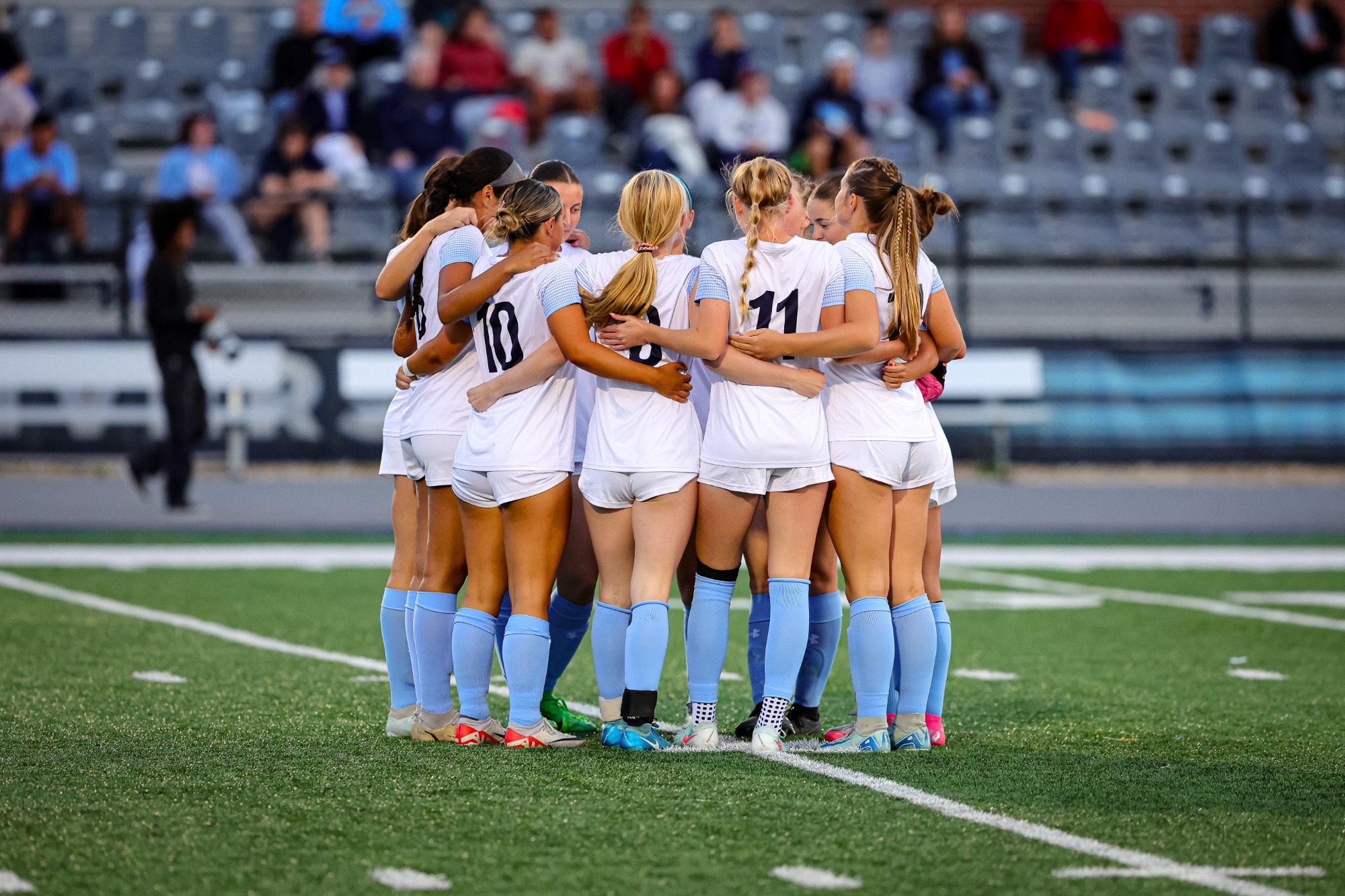 Elmhurst student-athletes and coaches during the Elmhurst Women's Soccer game vs. Ripon College on 9/9/2025 at Langhorst Field in Elmhurst, IL. Photo by Norman Cohen/Elmhurst Athletics.