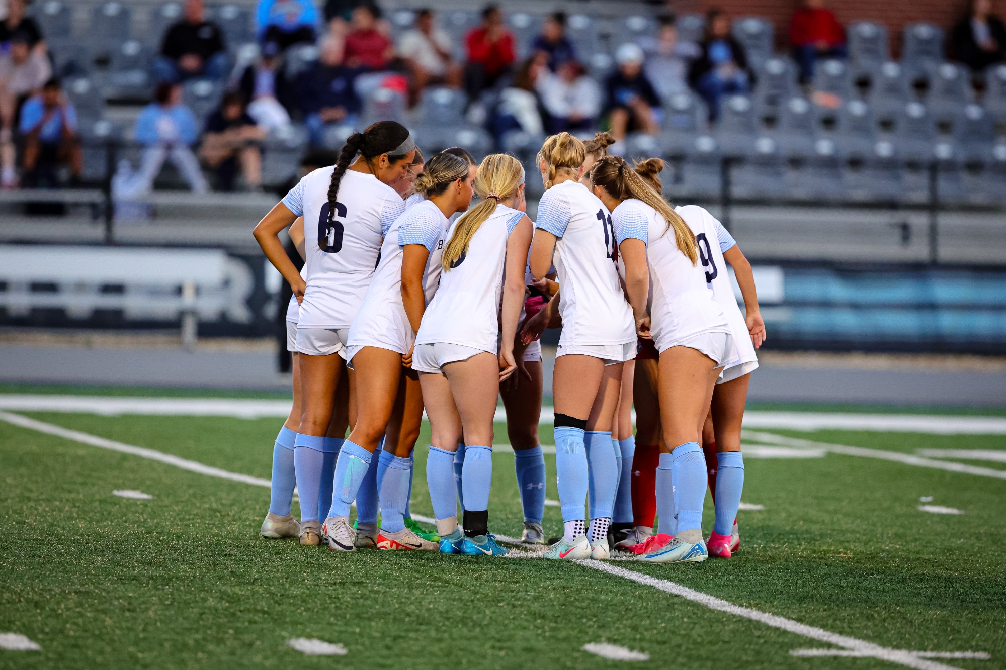 Elmhurst student-athletes and coaches during the Elmhurst Women's Soccer game vs. Ripon College on 9/9/2025 at Langhorst Field in Elmhurst, IL. Photo by Norman Cohen/Elmhurst Athletics.