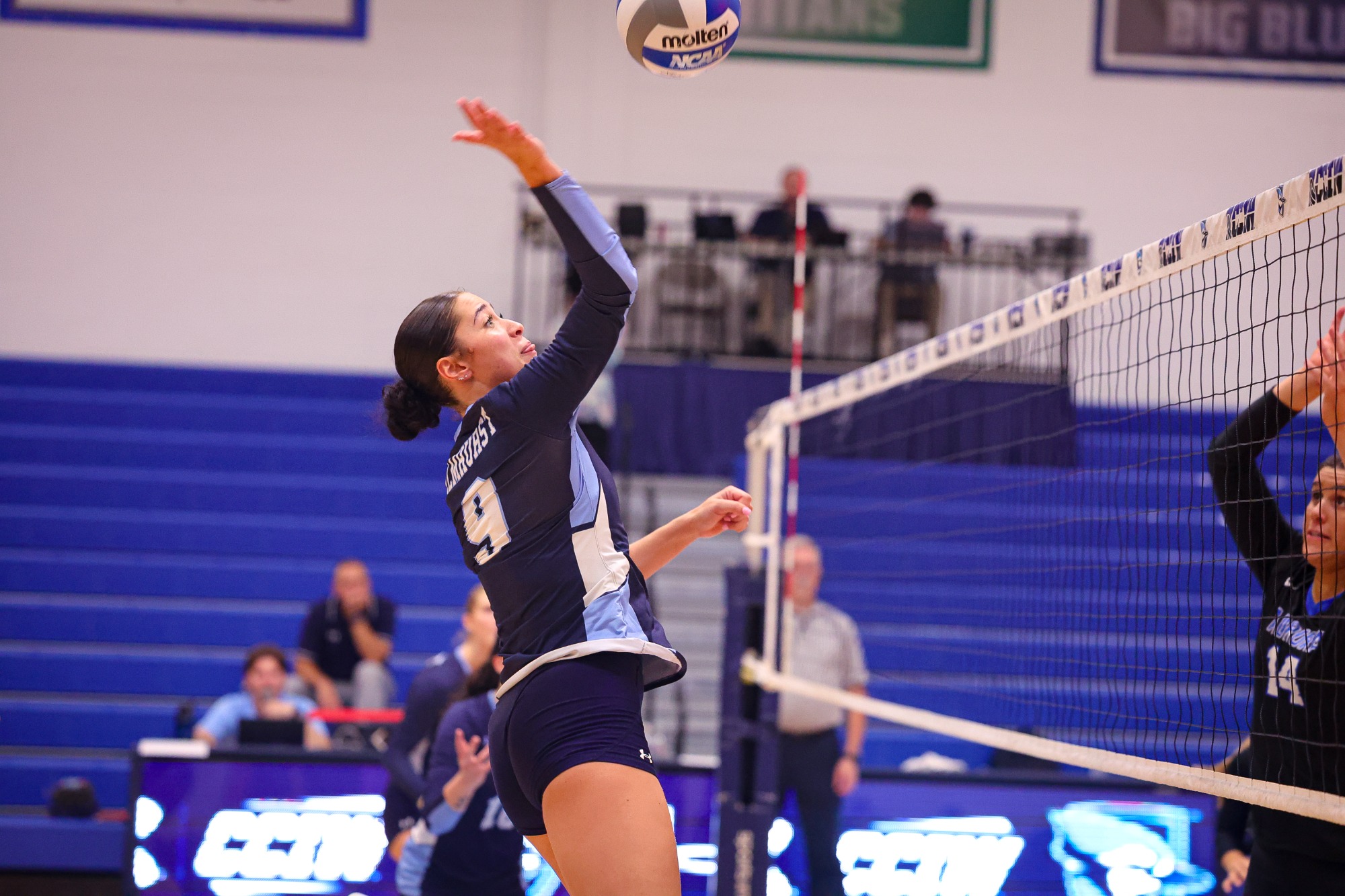 Nyah Moustakas during the Elmhurst Women's Volleyball match vs. Aurora University on 9/19/2025. Photo by Norman Cohen/Elmhurst Athletics.