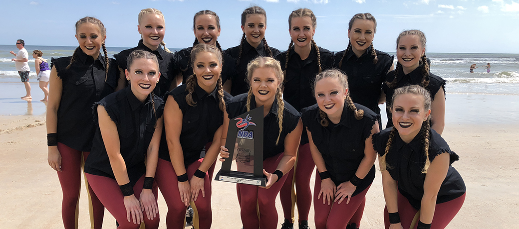 The Elon dance team with their trophy following the NDA national competition in Florida