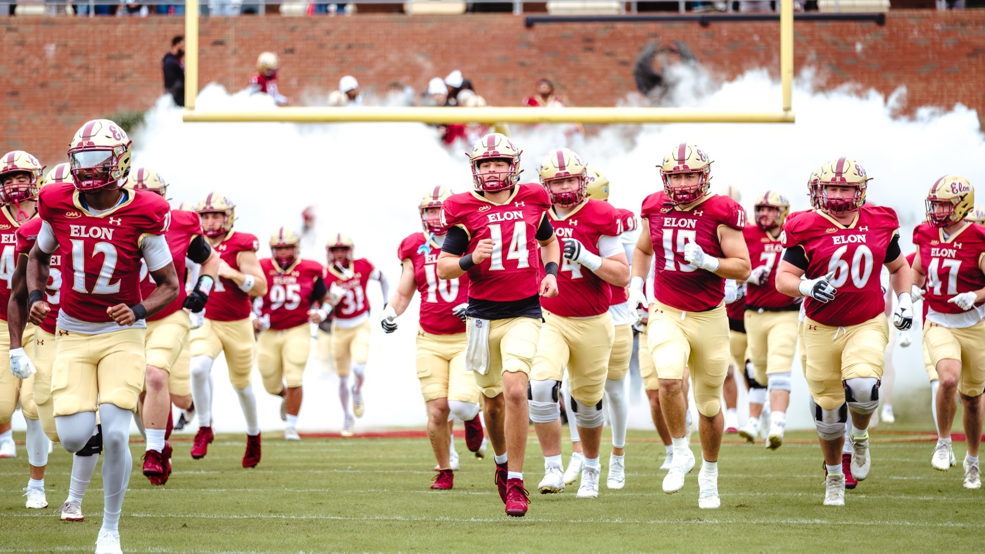Football Team Running down the hill 