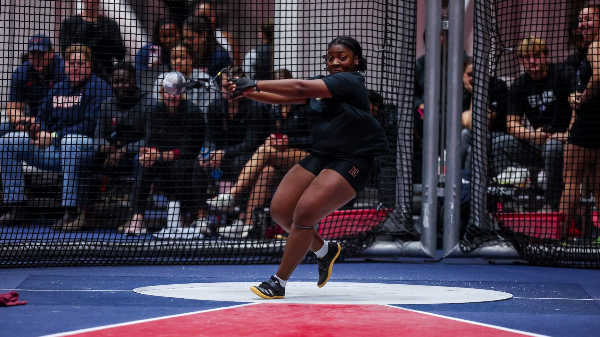 Adriana Clarke in the weight throw at the Liberty Kickoff on Dec. 4