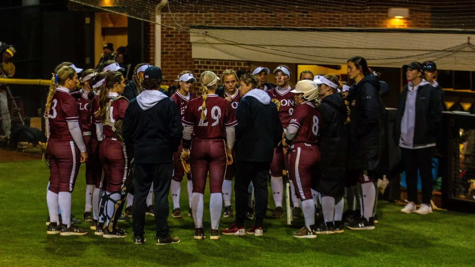 Elon Softball huddle versus NC Central on Feb. 7