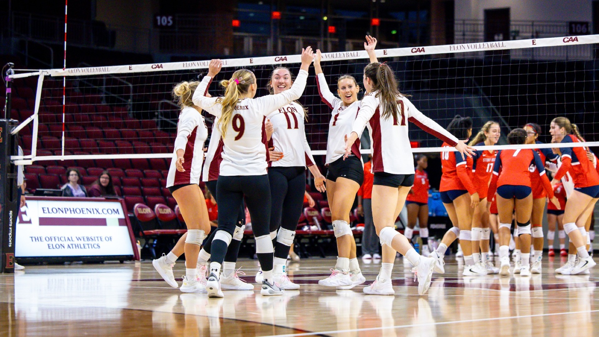 Elon Volleyball celebrates versus Stony Brook on Oct. 2
