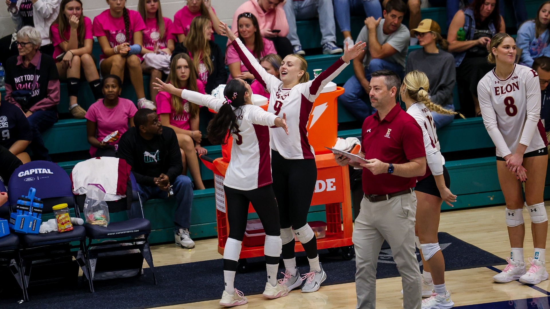 Shannon O'Laughlin and Dani Wallace celebrate versus UNCW on Oct. 24