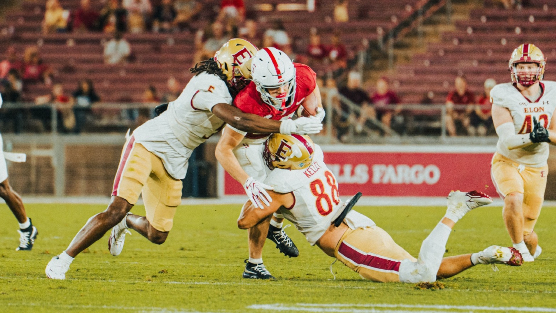 Tyler Hart and Owen Kelley Making a Tackle
