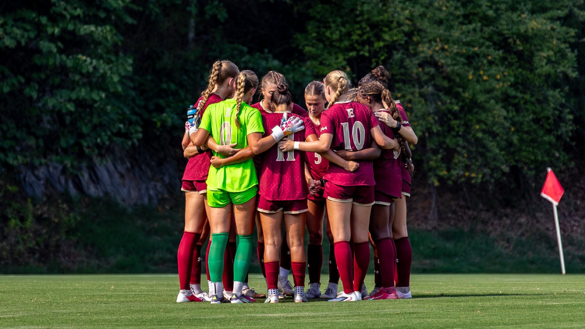 Women's Soccer huddle at VMI