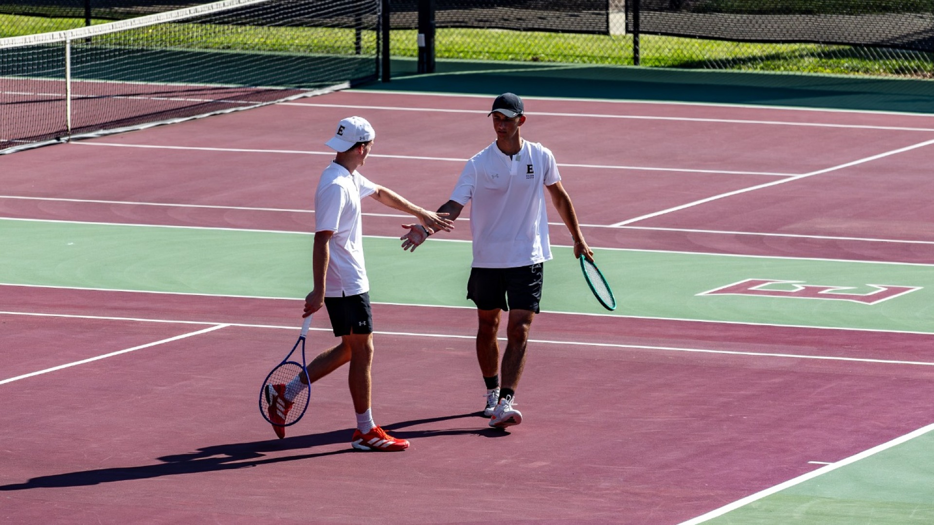 Nikola Parichkov and Charles Pilet high five