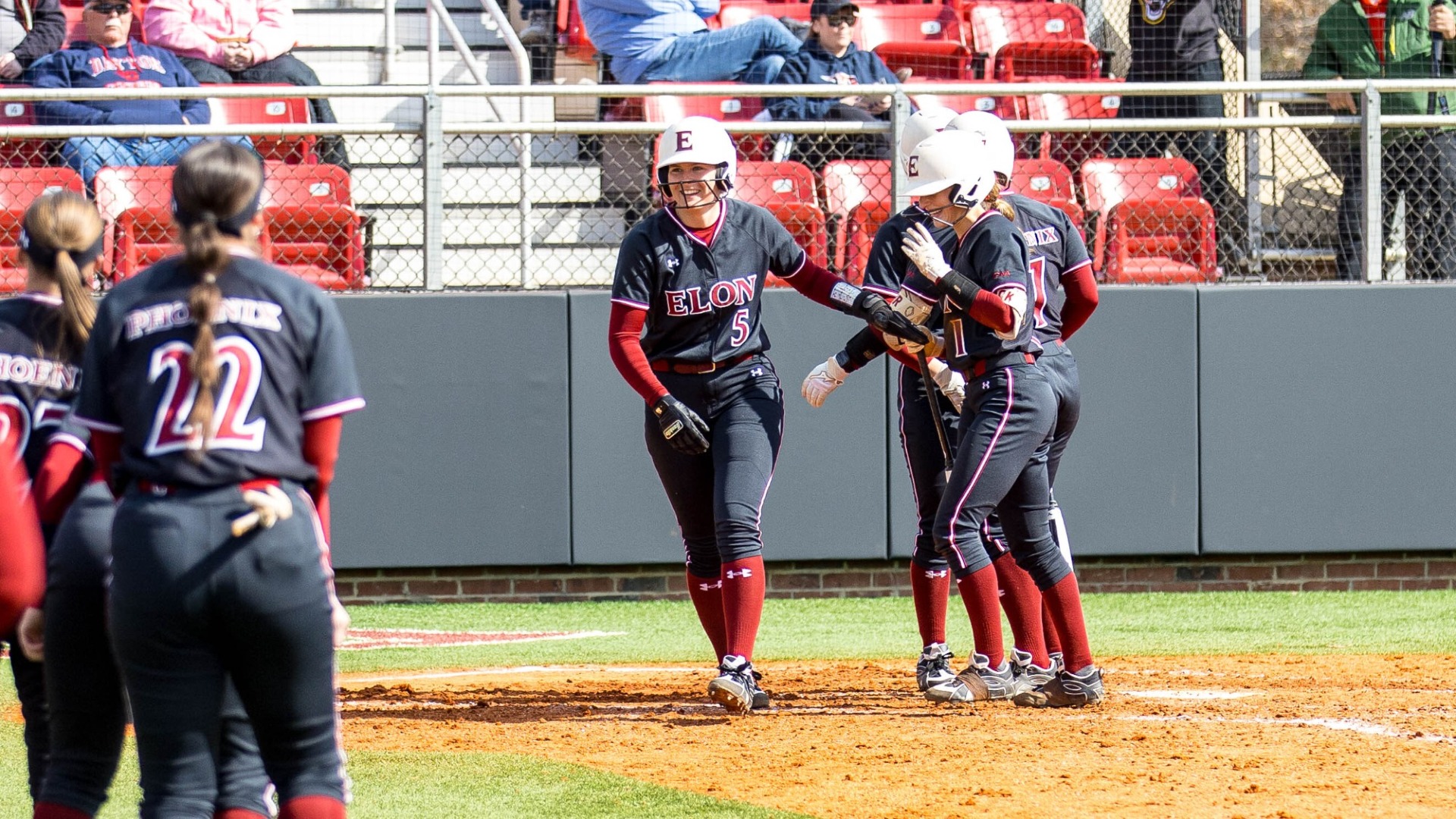 Chloe Hatzopoulos celebrates at home plate versus Dayton