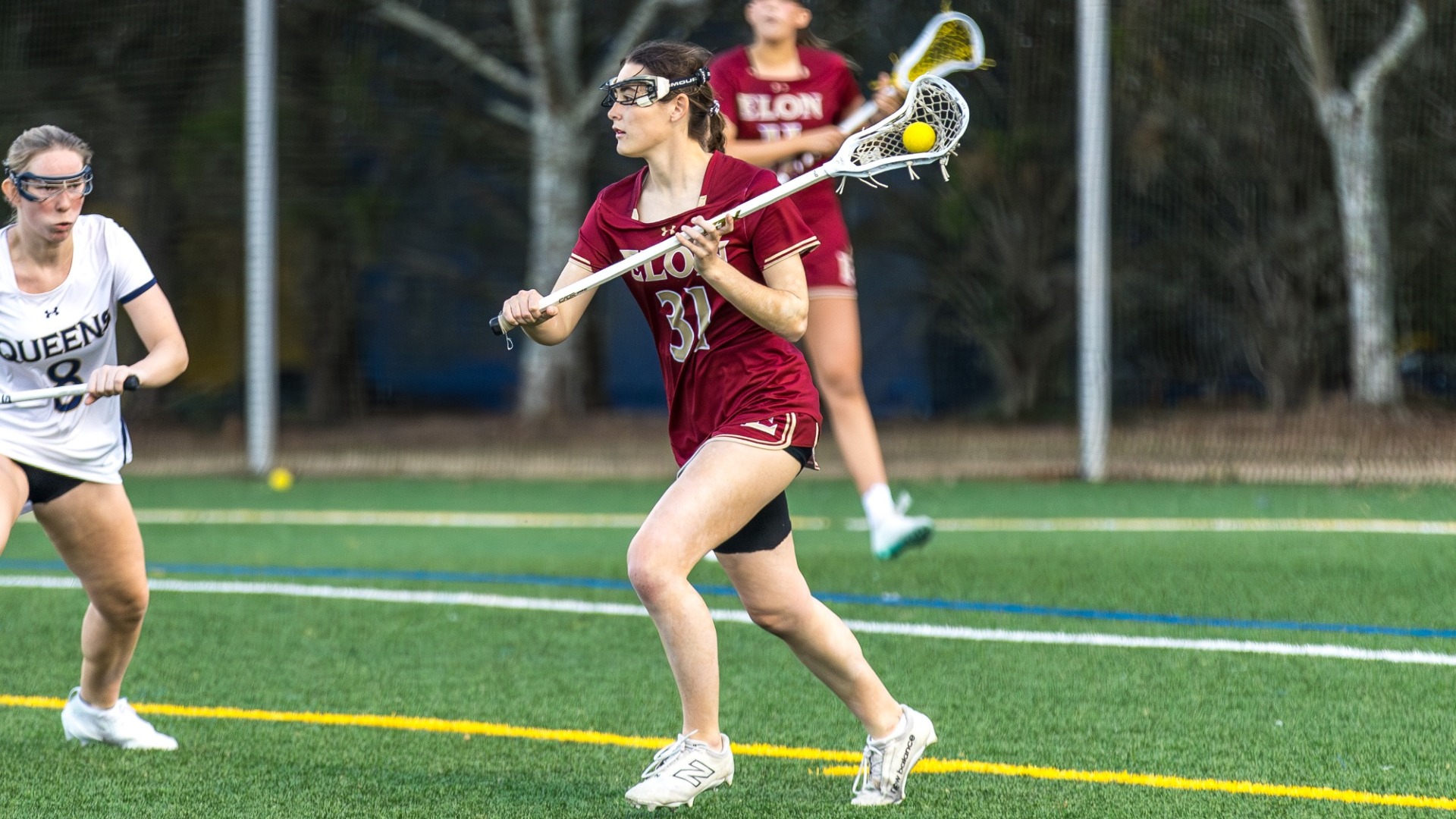 Danielle Swietoniowski handles ball vs. Queens