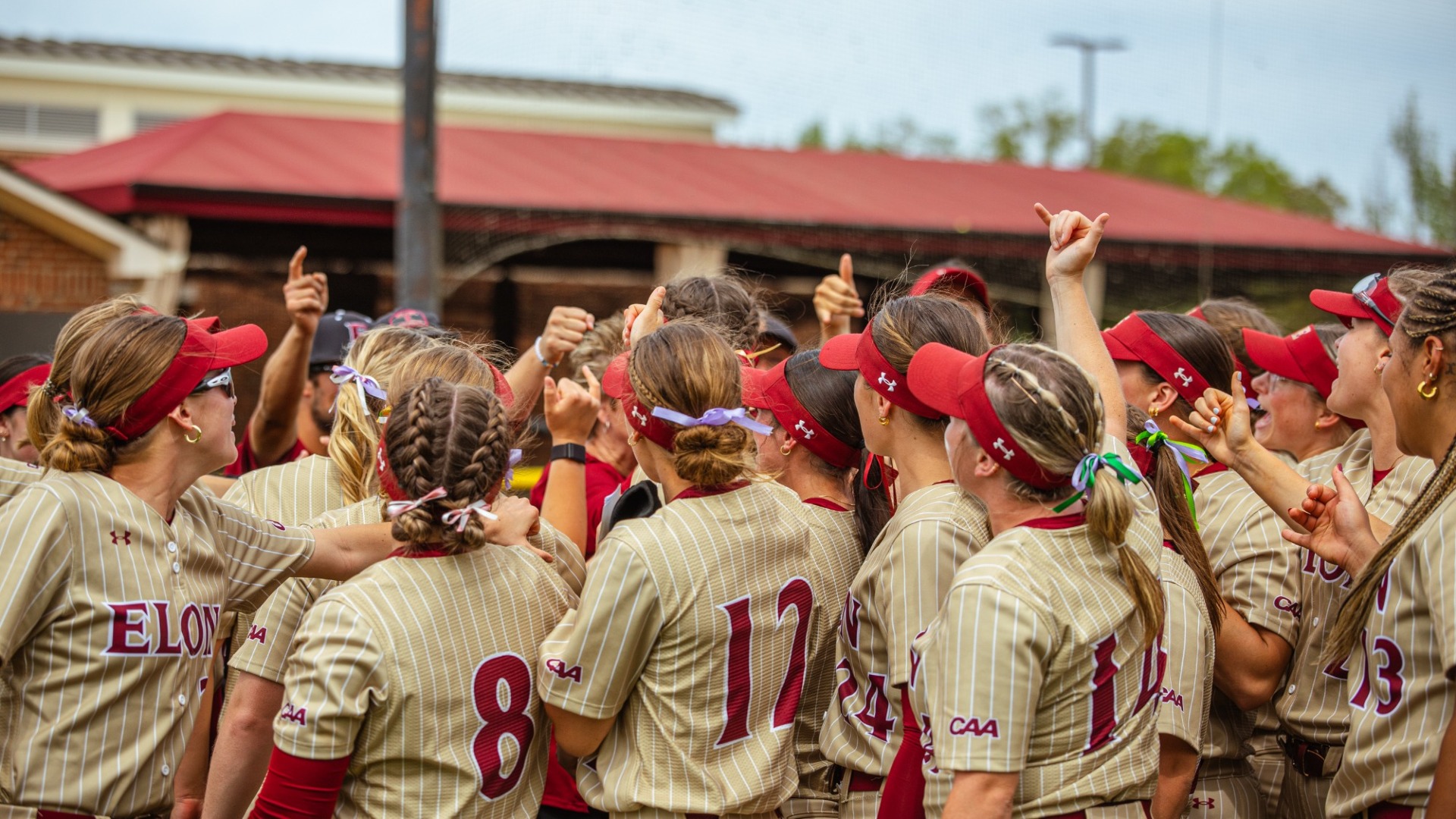 Elon Softball huddle versus Charleston