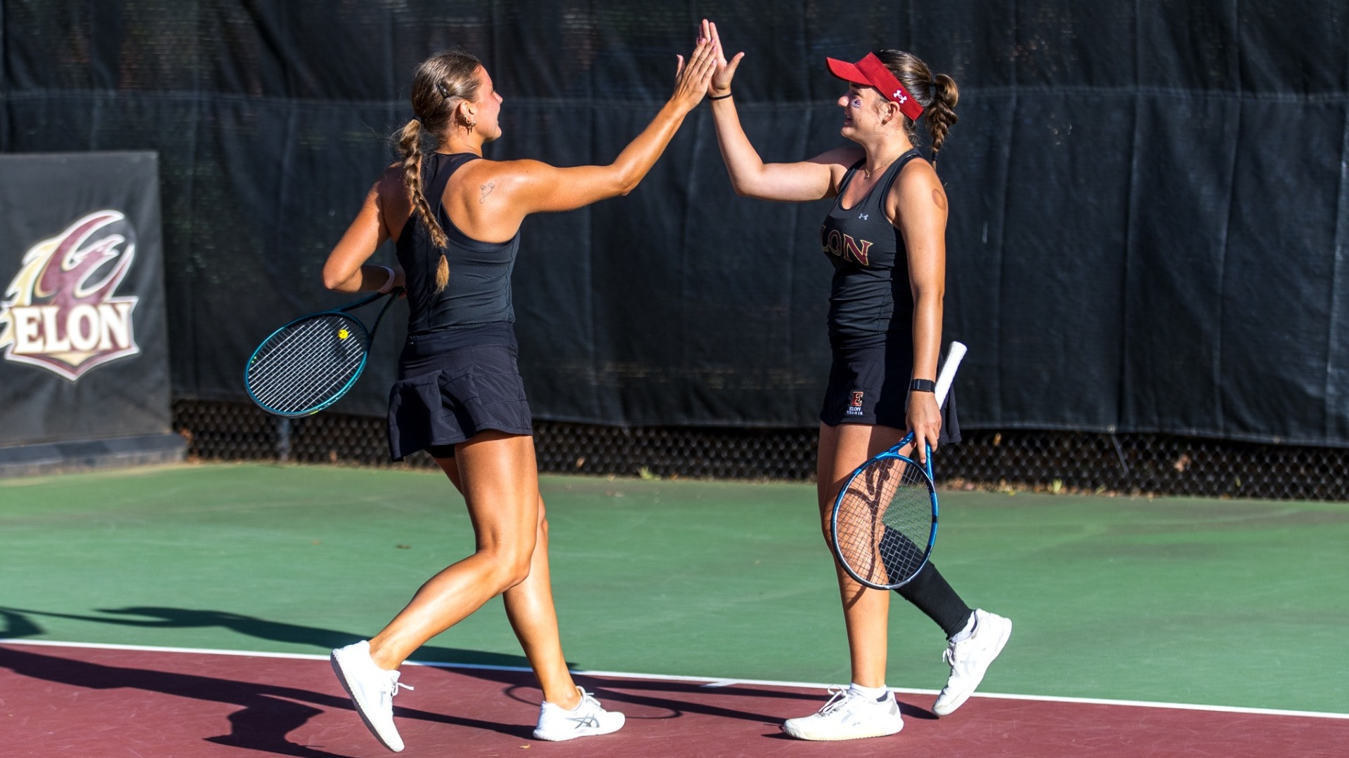 Lisa Kranec and Cornelia Kack doubles high five