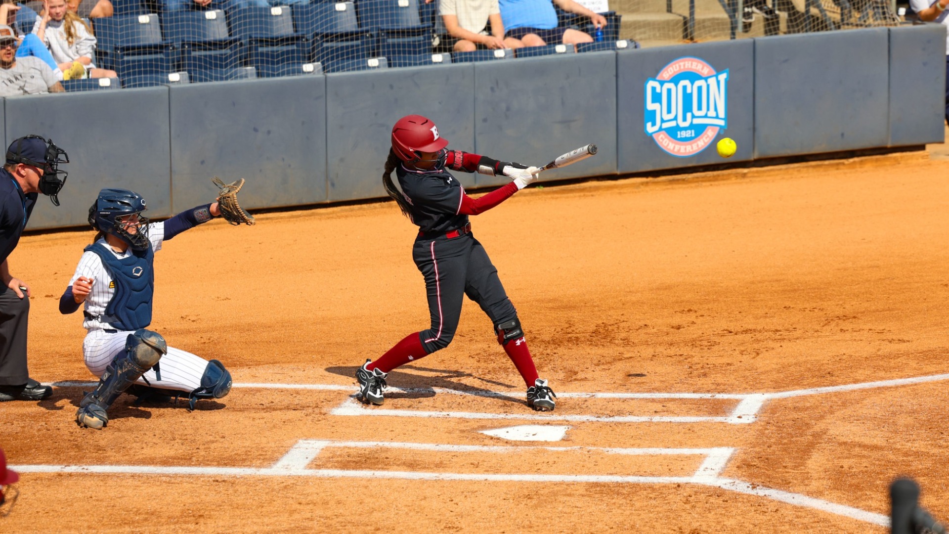 Mauri Murray take a hit at the plate at UNCG on March 1