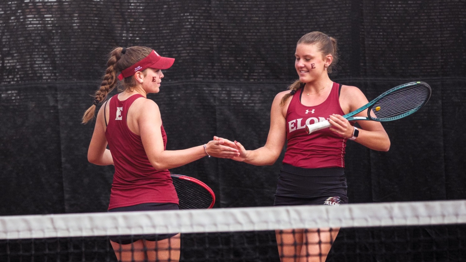 Cornelia Kack and Nathalie Marinovitch doubles high five vs. SC State