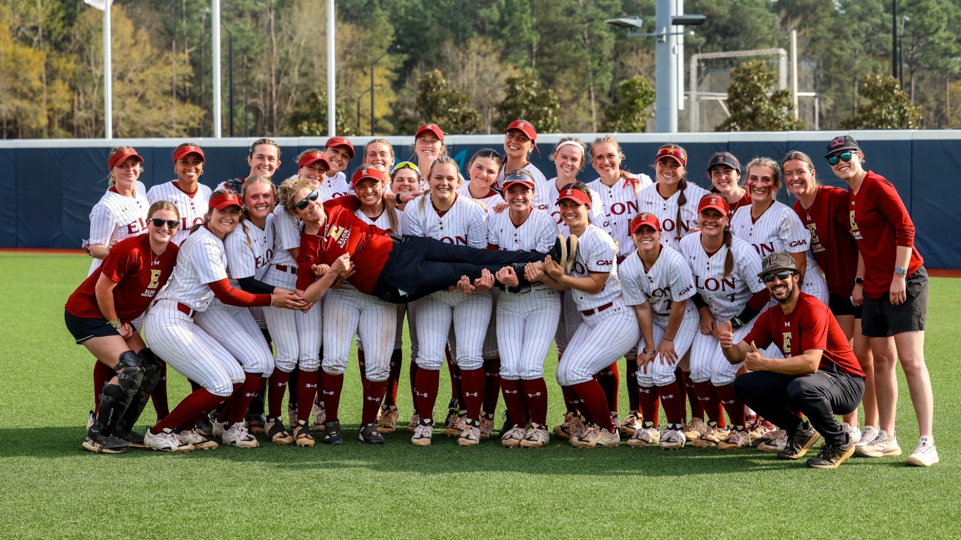 Elon Softball celebrates Kathy Bocock's 600th career win at UNCW on March 21