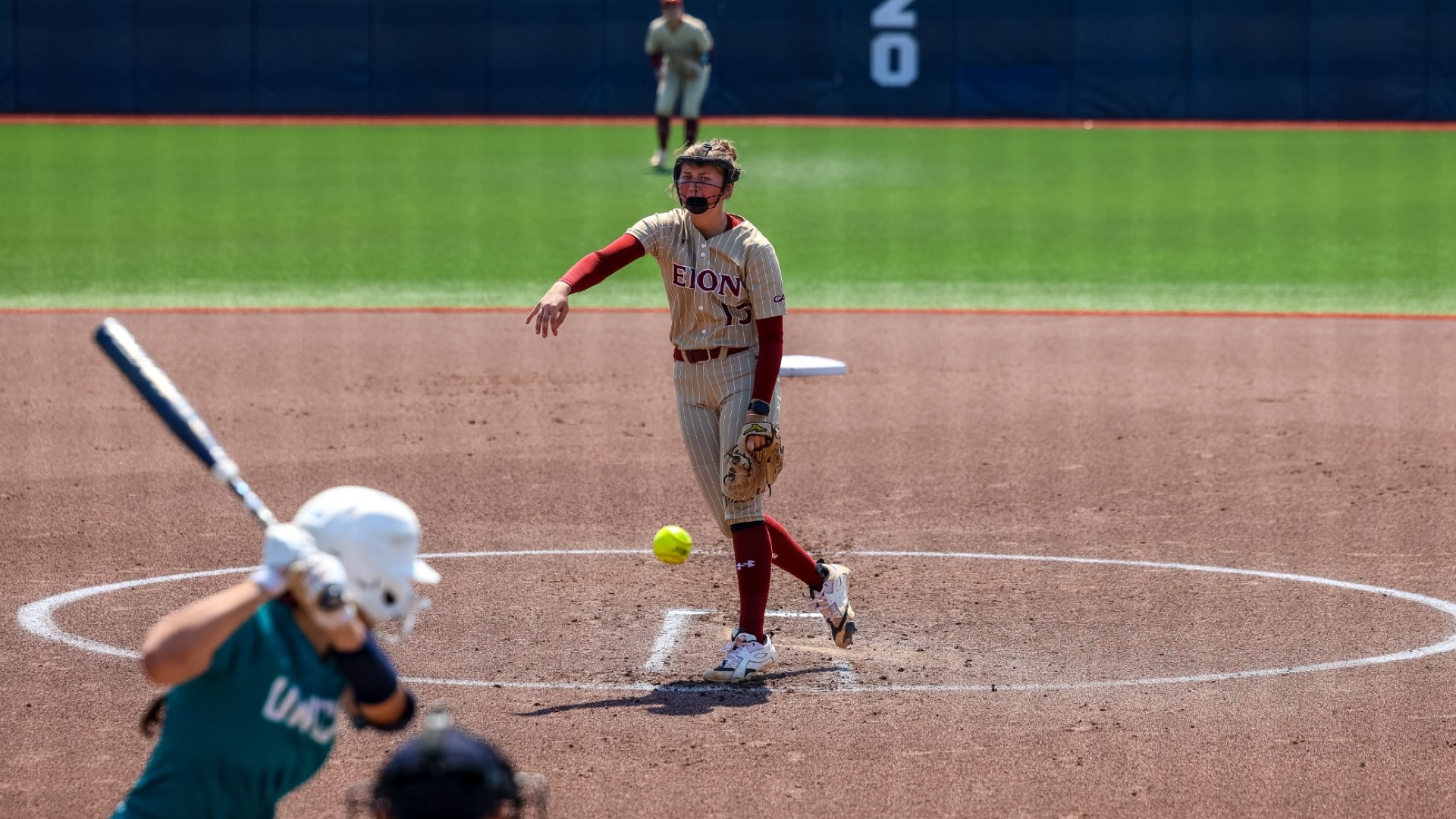 Anna Dew pitching at UNCW on March 22