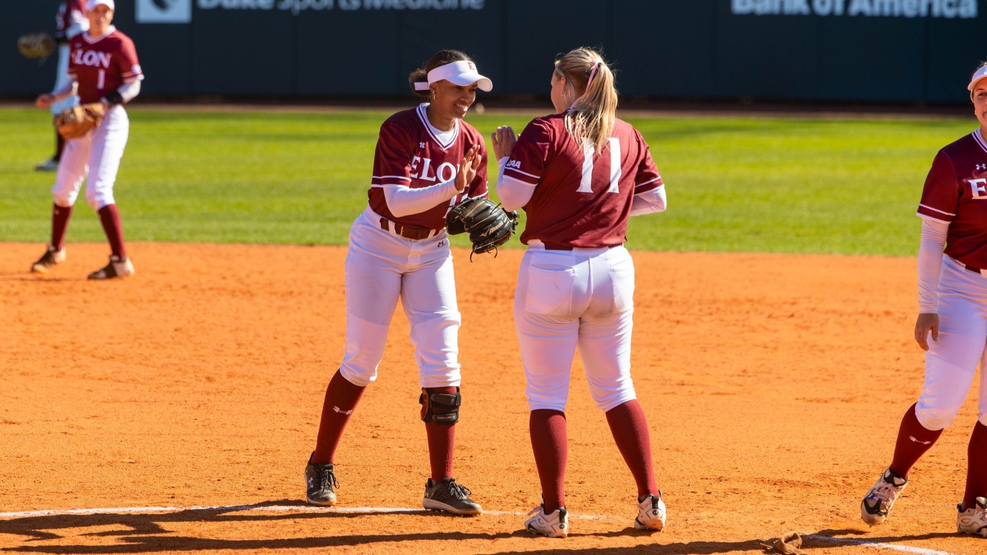 Mauri Murray and Kyra Leonard greet each other versus Wofford on March 24