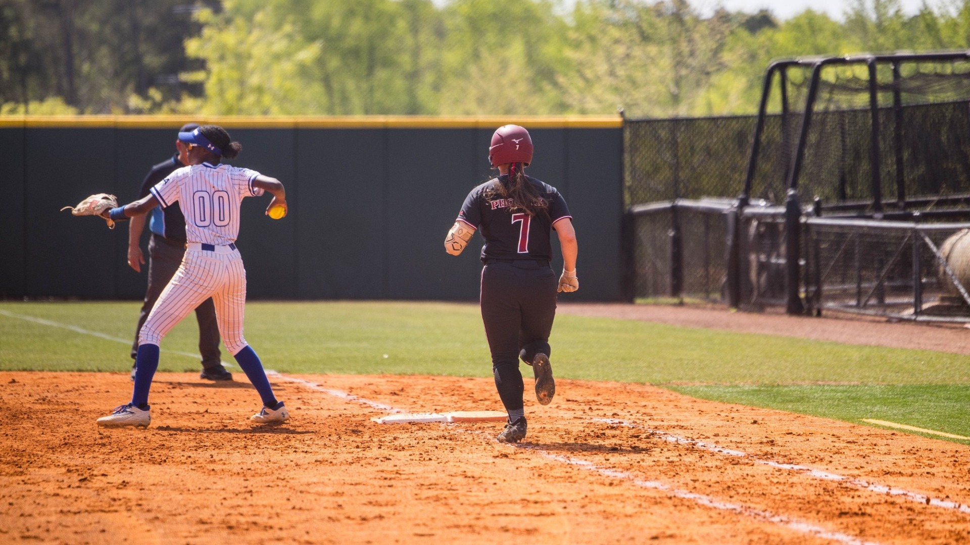Teagan Baulsir running down to first base versus Hampton on April 11