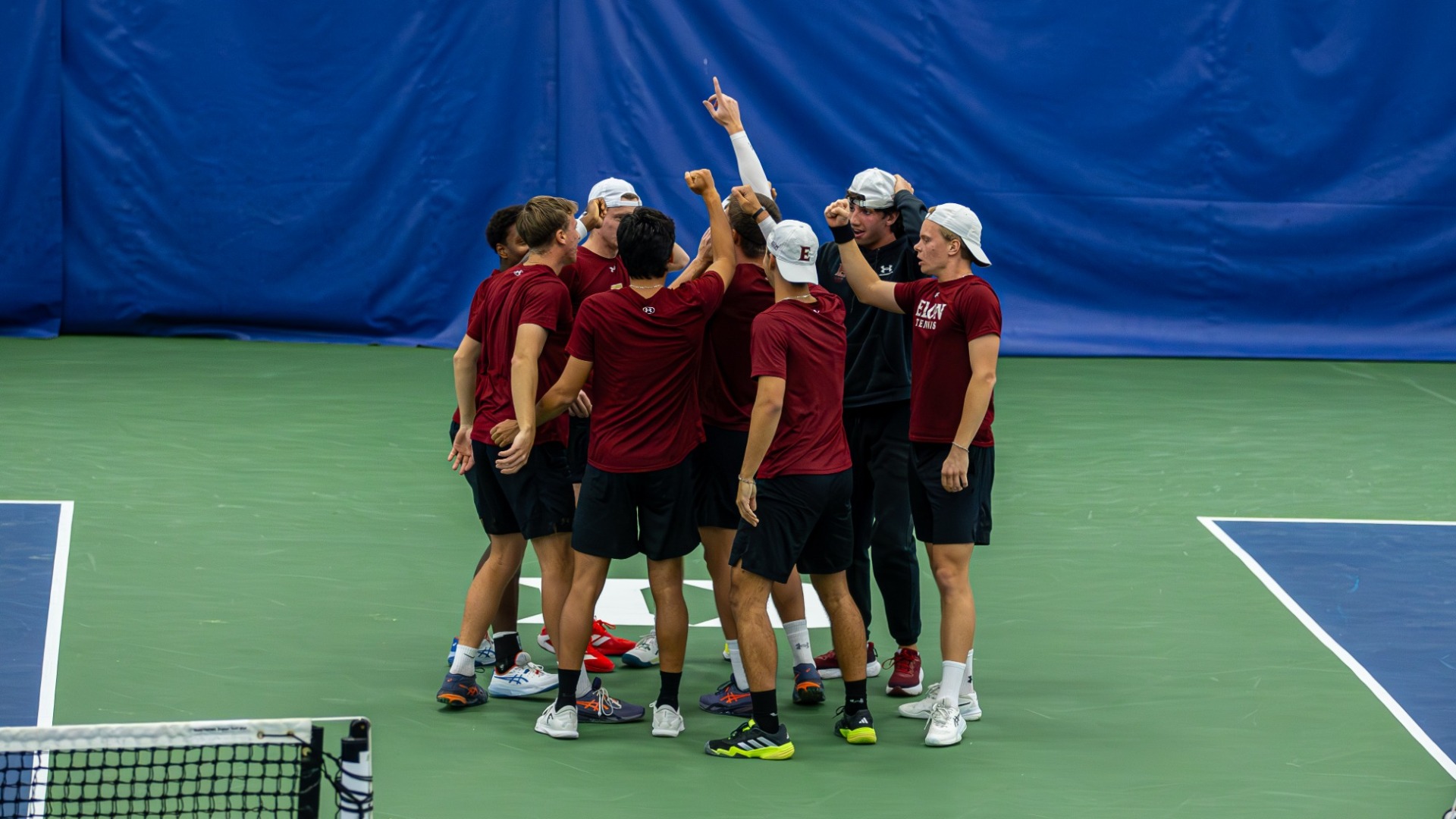 Men's Tennis huddle