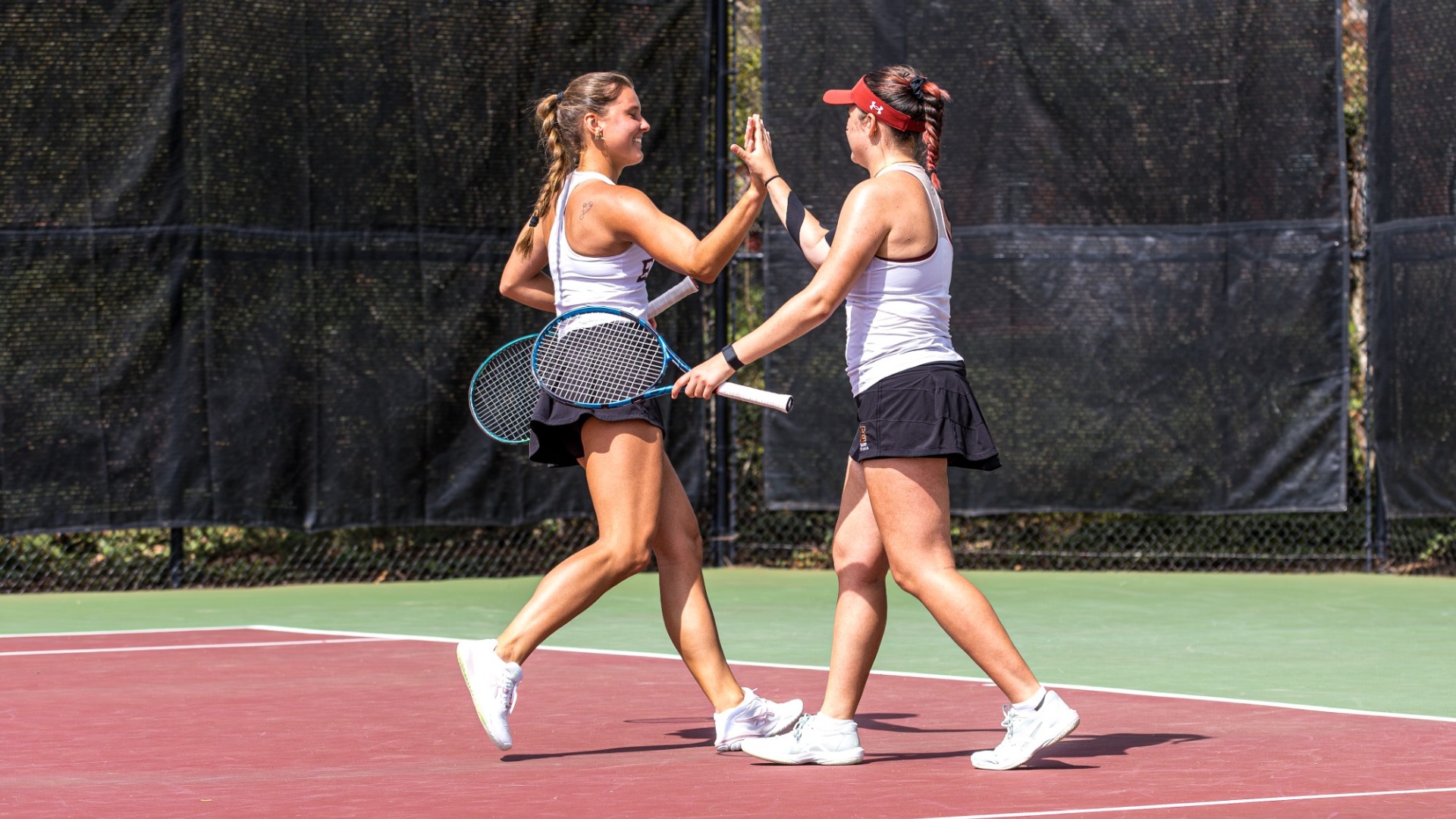 Cornelia Kack and Lisa Kranec high five
