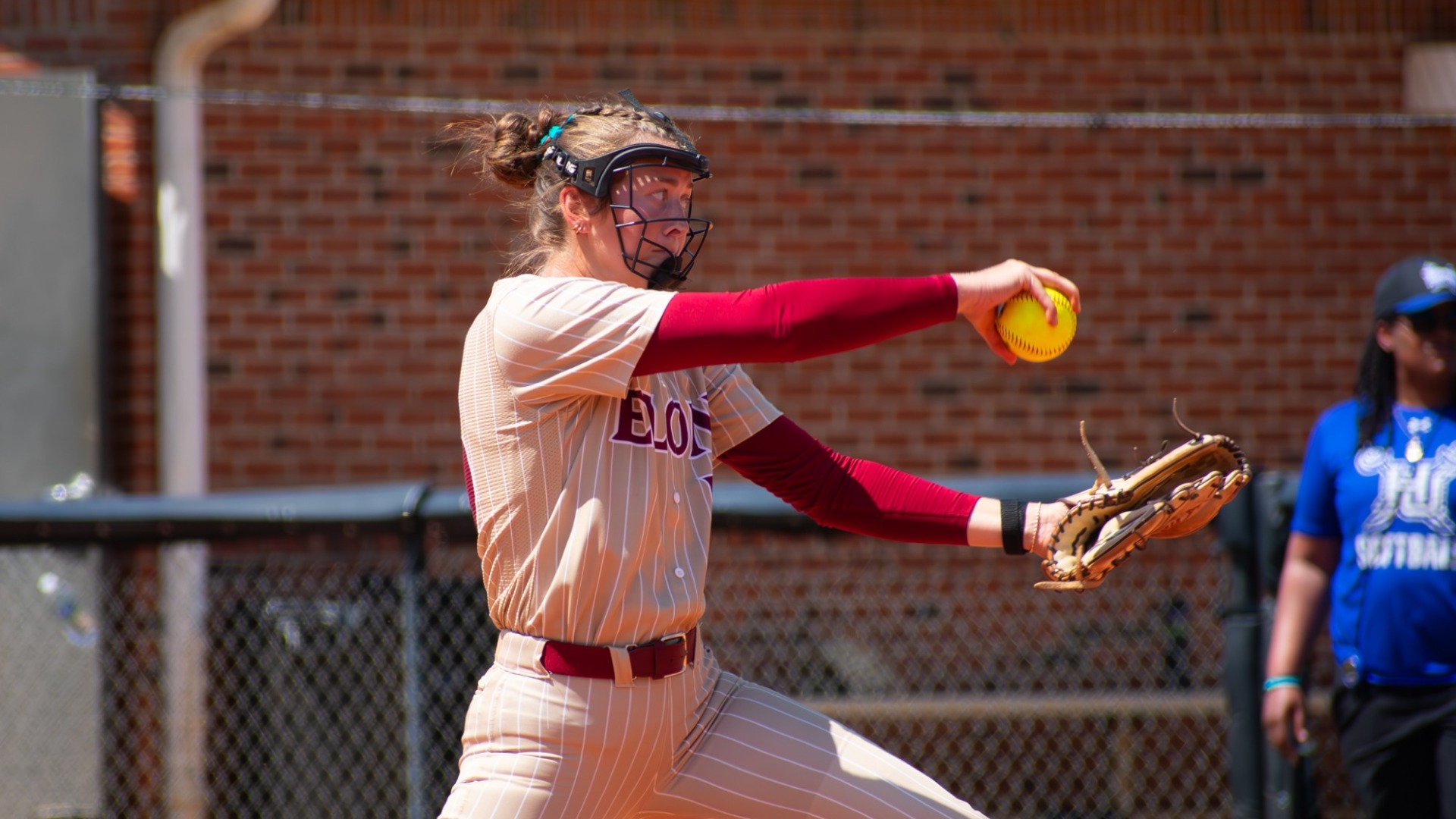 Anna Dew pitching. vs. Hampton