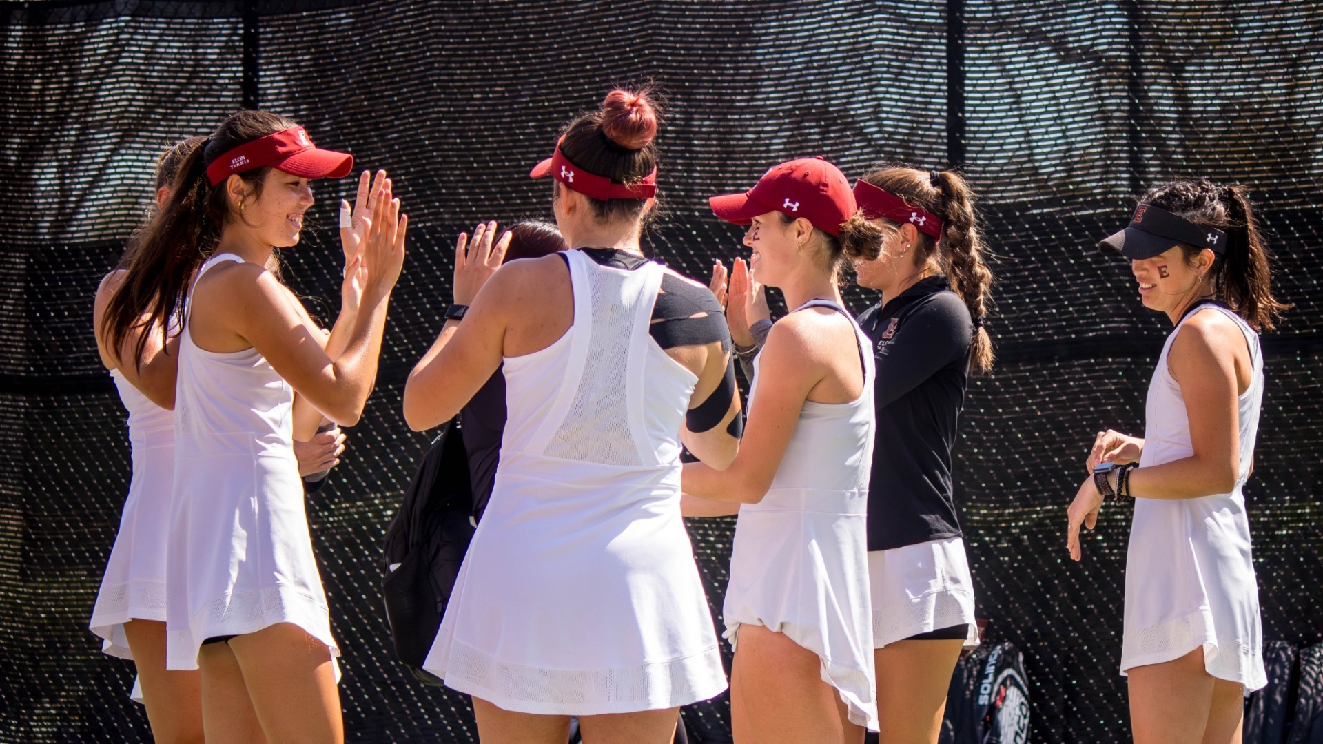 Women's tennis pre-match huddle vs. UConn