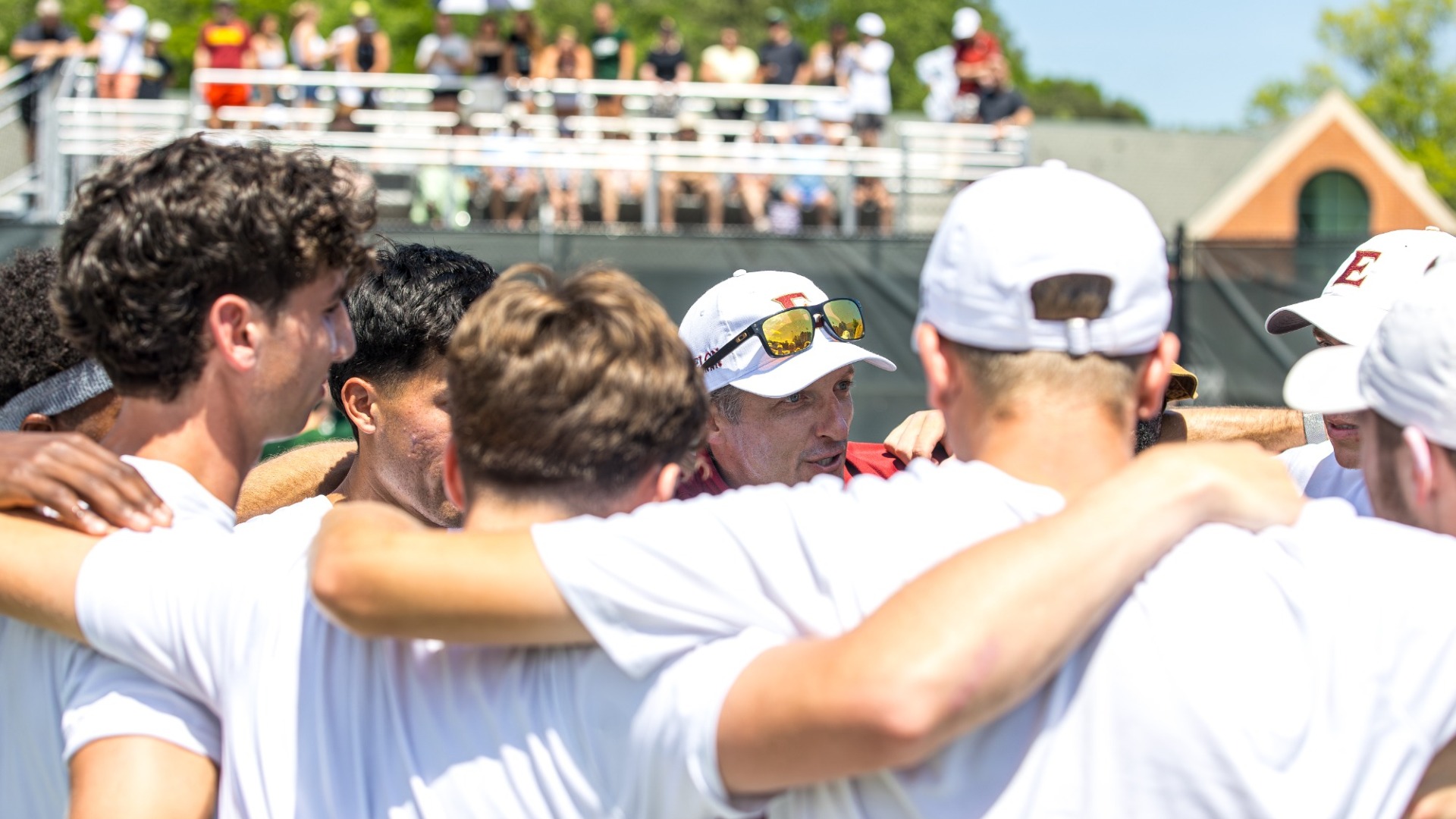 Men's tennis huddle