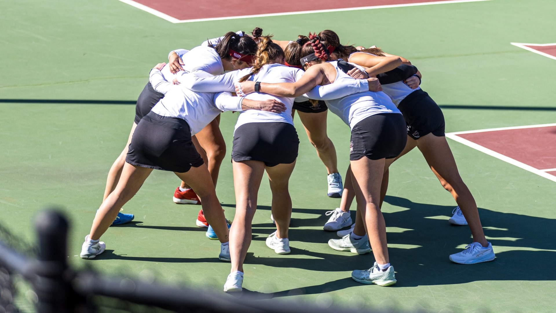 Women's tennis huddle
