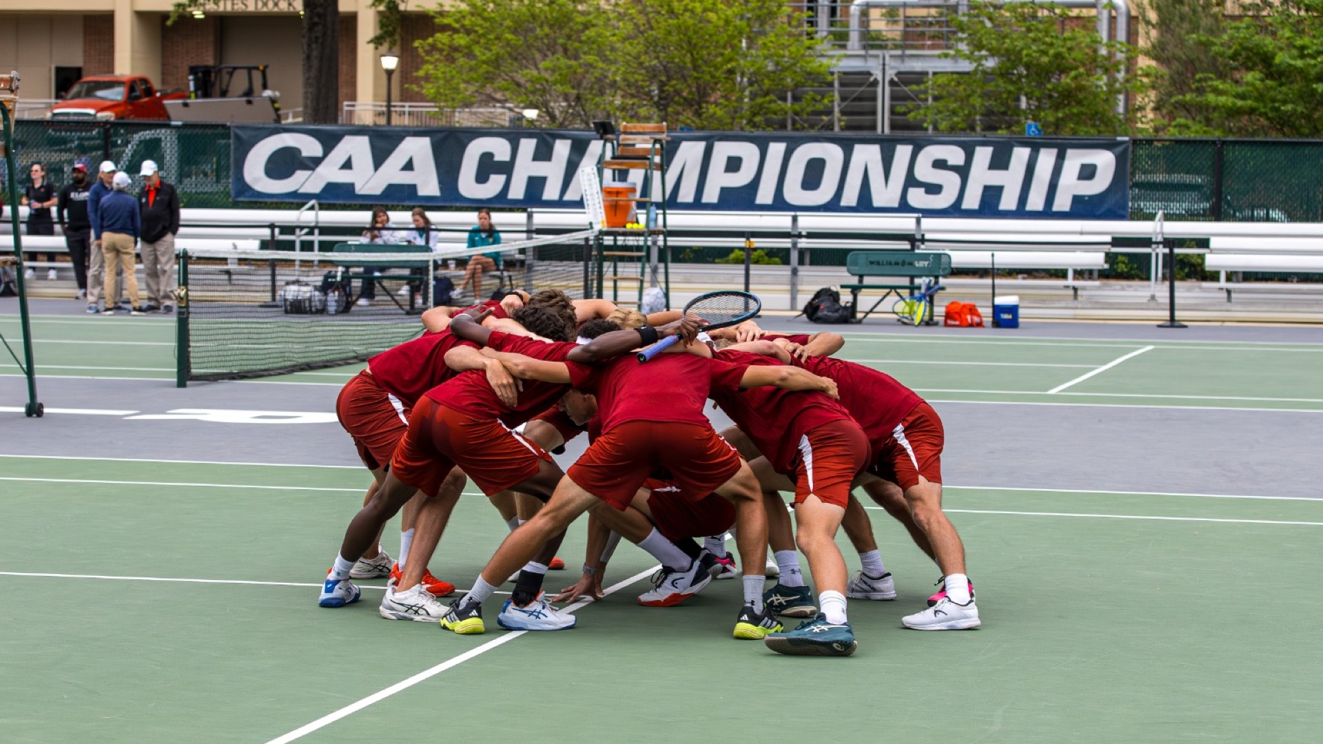 Men's Tennis huddle