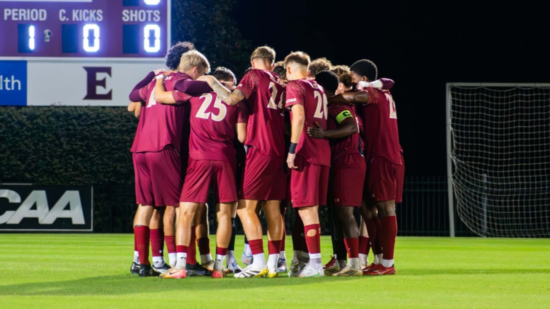 Men's Soccer Team Huddle