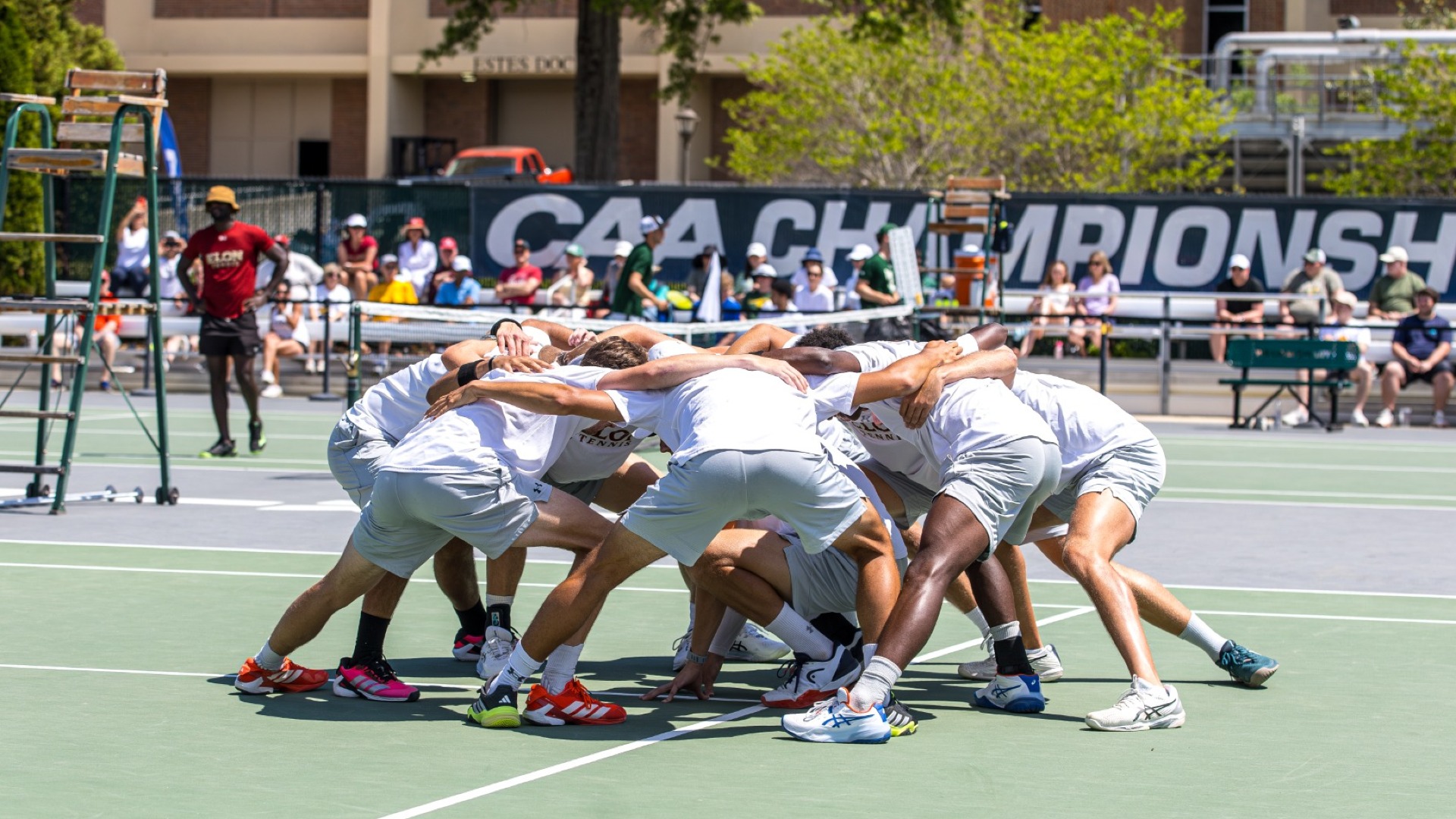 Men's tennis huddle