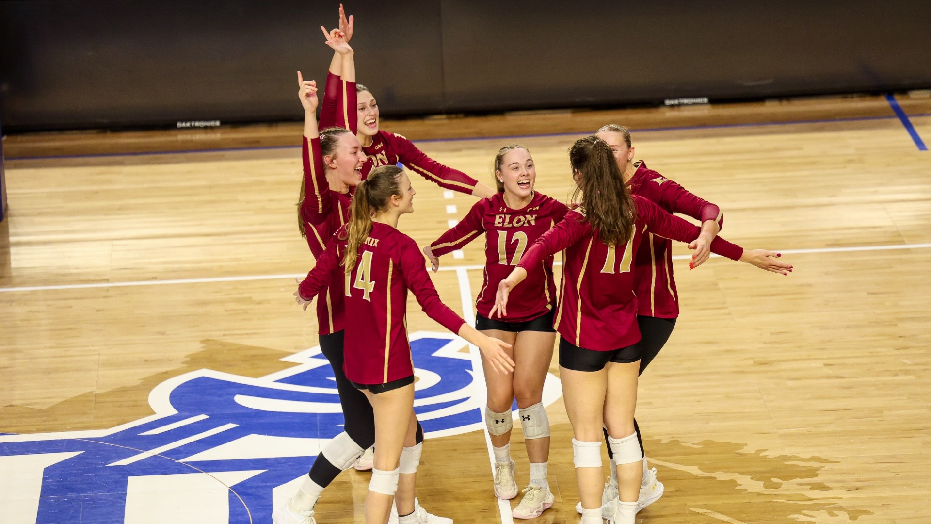Elon Volleyball celebrates a kill at Hampton
