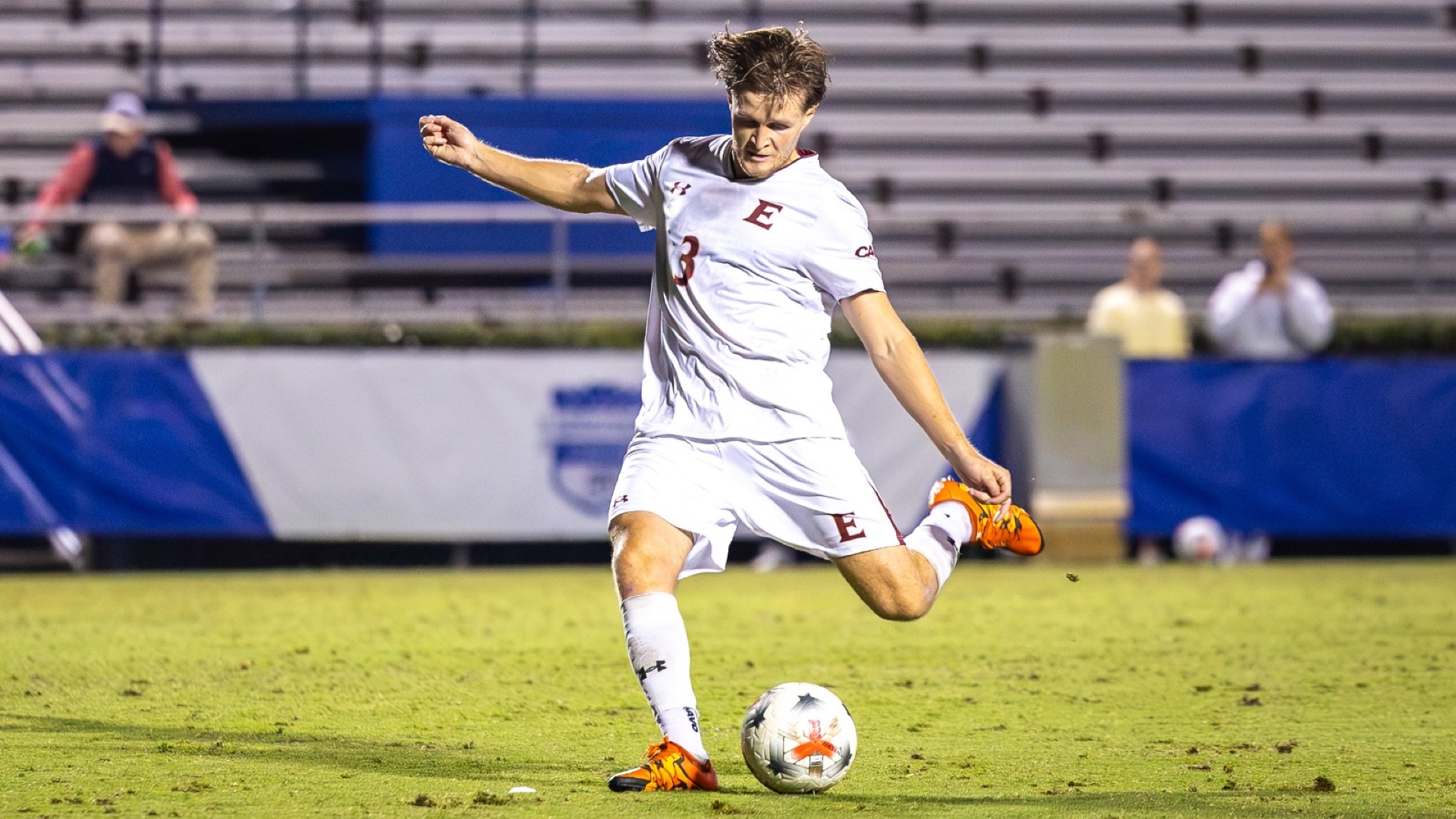 Joe Taylor kicks ball at Duke