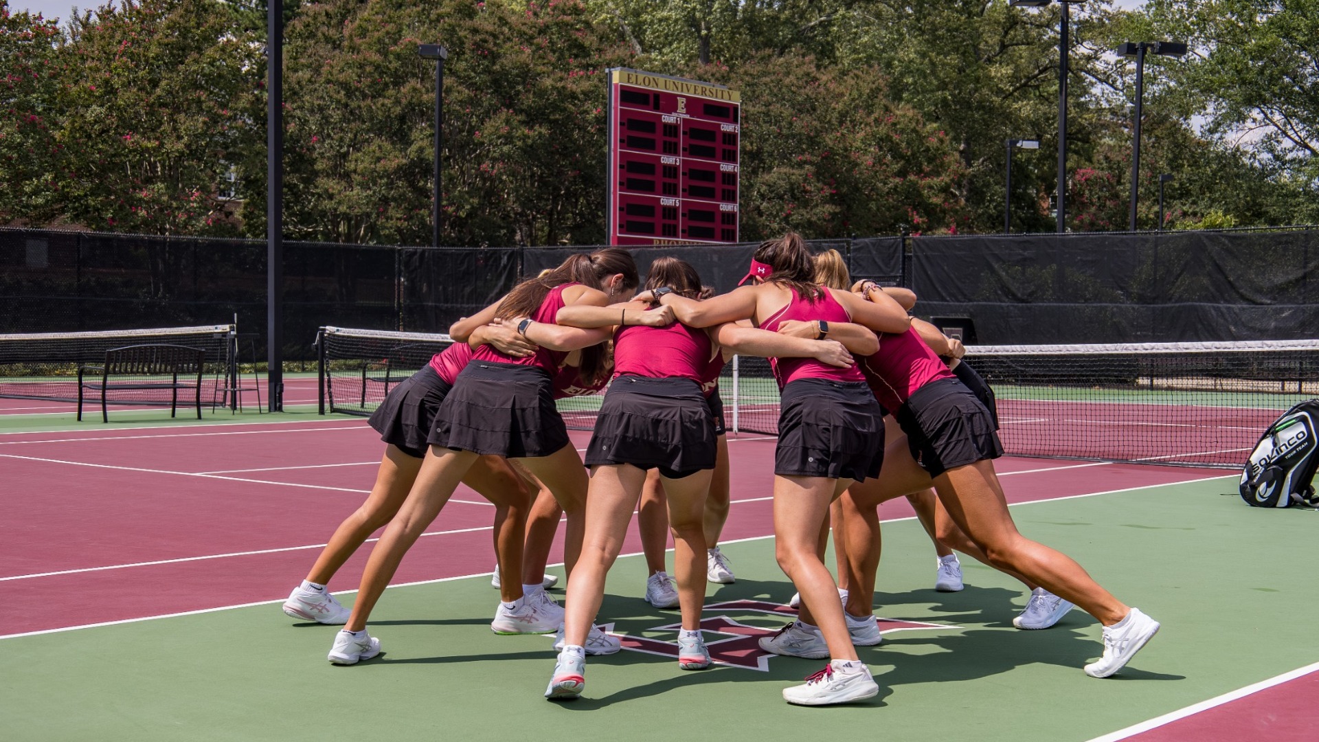 Women's Tennis team huddle