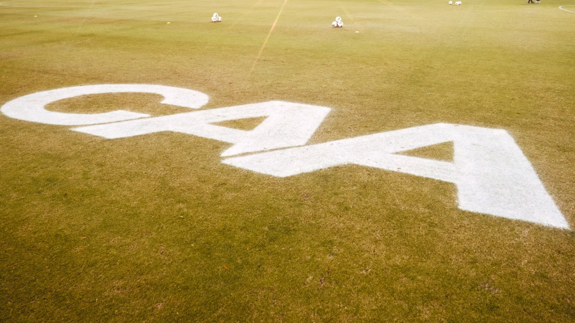 CAA on field at men's soccer