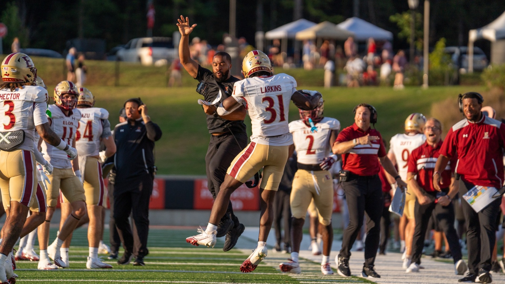 Football: Nate Harris and Codey Larkins Celebrate a Blocked Punt