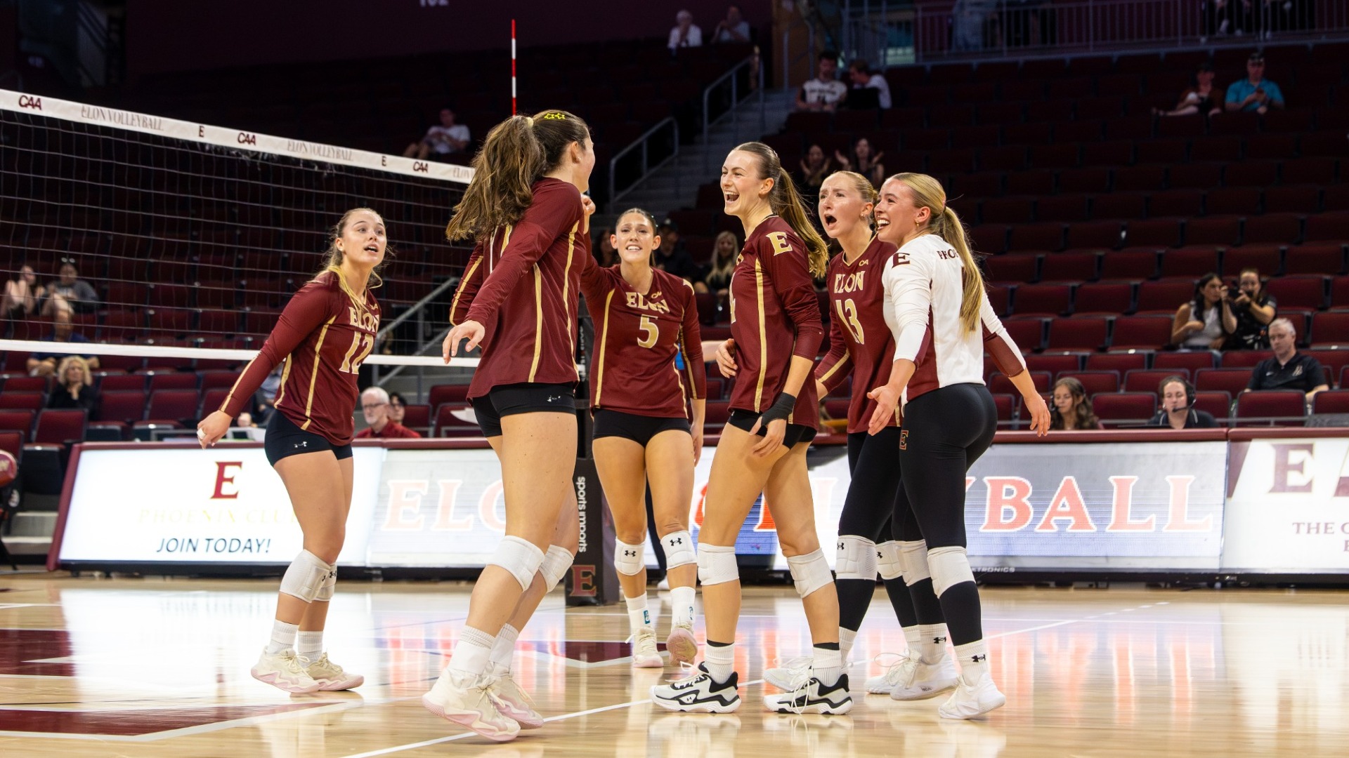 Elon Volleyball celebrates versus App State on Sept. 8