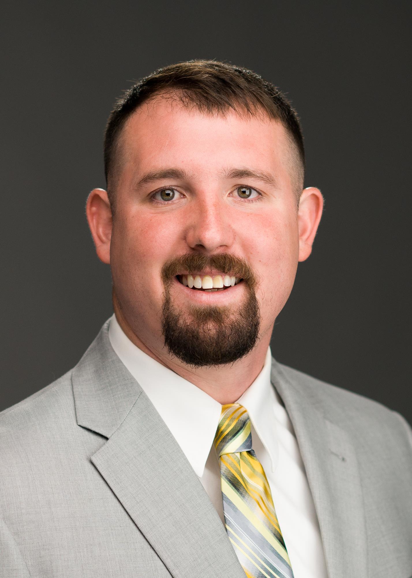 Portrait of 2019-20 Men's Basketball assistant coach, Chase Dippel, on October 4, 2019.