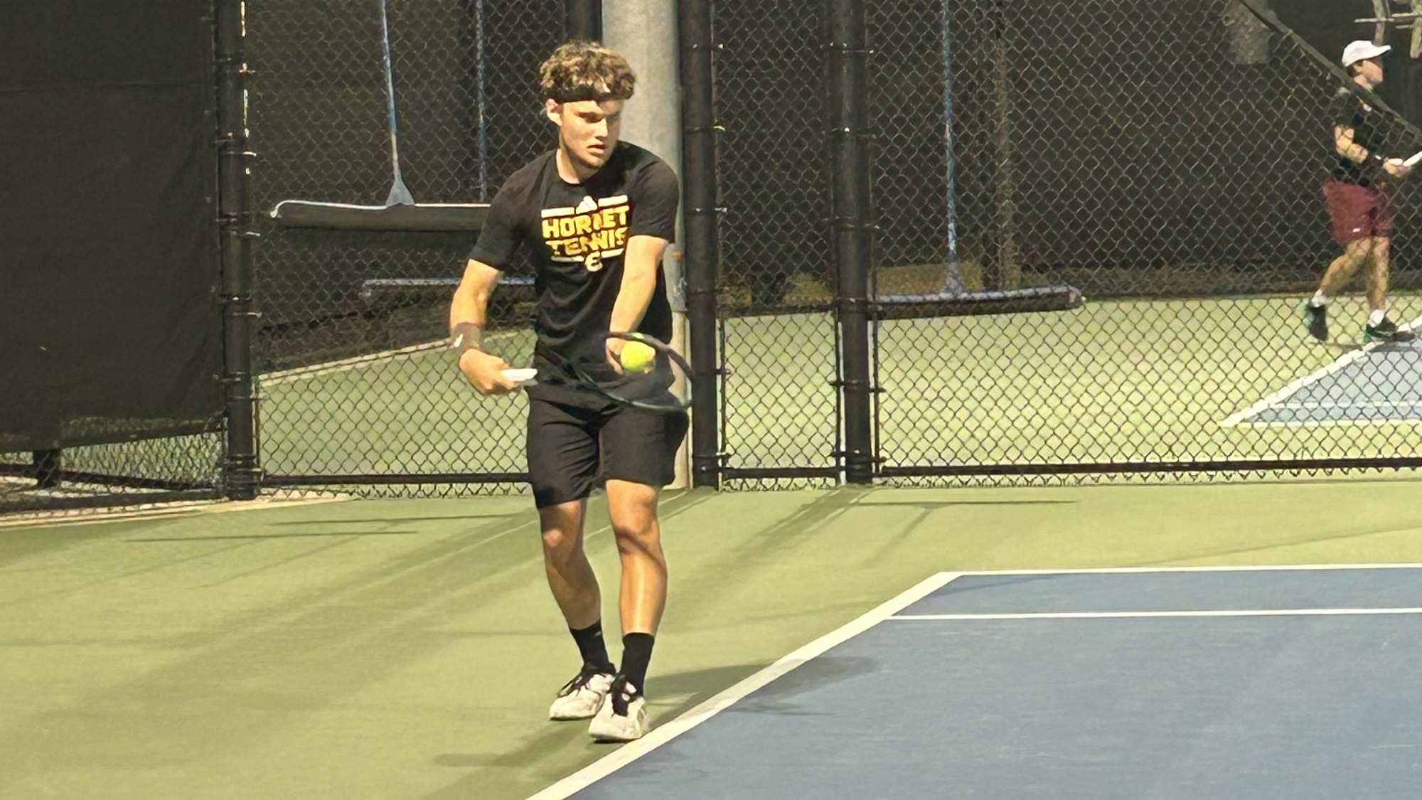 2026 Emporia State Men's Tennis Alexis Mattenberger serving