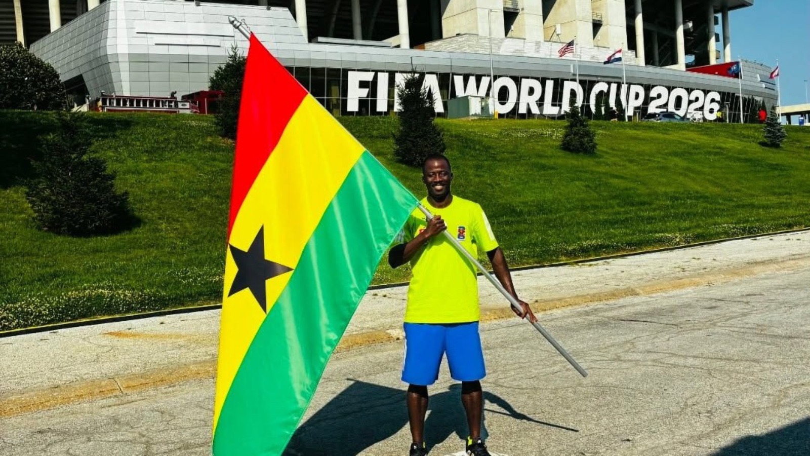 2026 Emporia State Track & Field Israel Domeh with Ghana flag at World Cup in Kansas City