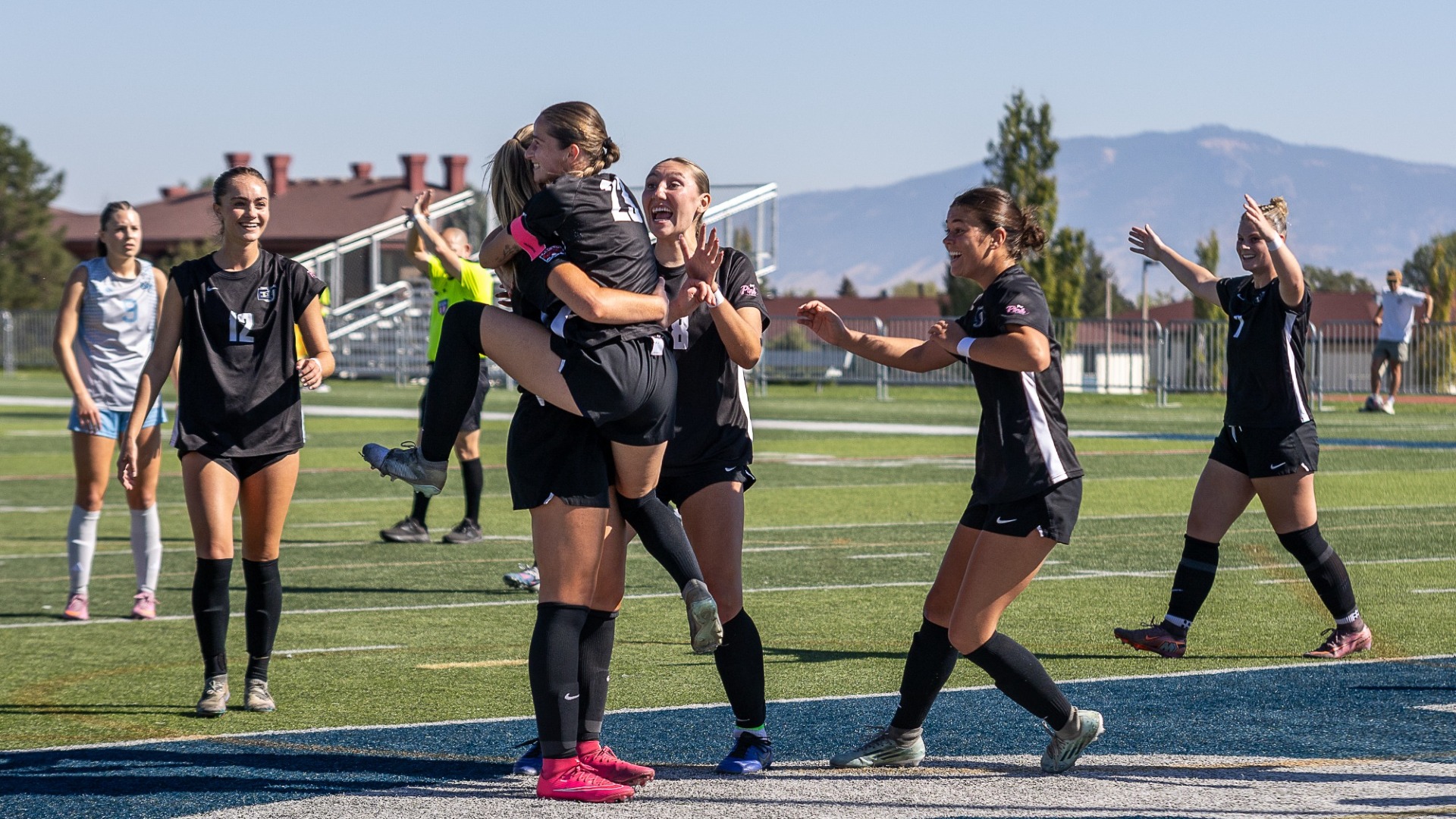 W. Soccer celebrates Jones' goal